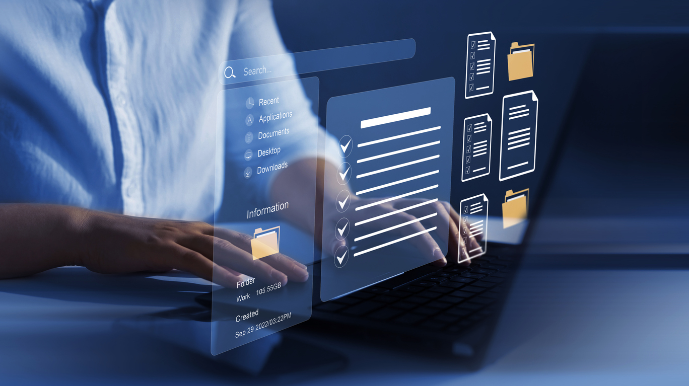 Business person working at laptop computer and digital documents with checkbox lists. Law regulation and compliance rules on virtual screen concept.